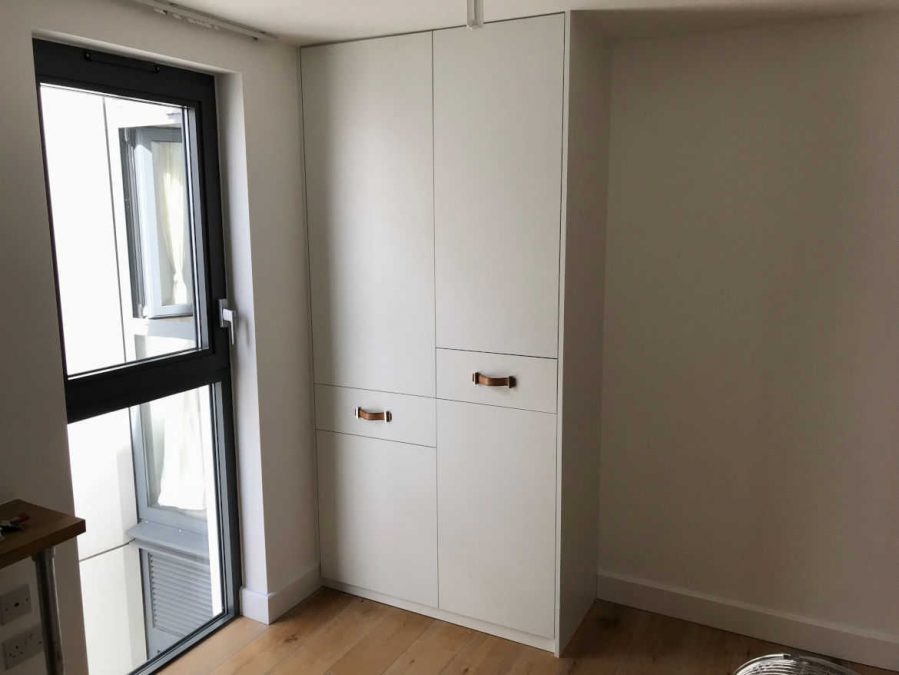 plain white bespoke cupboard